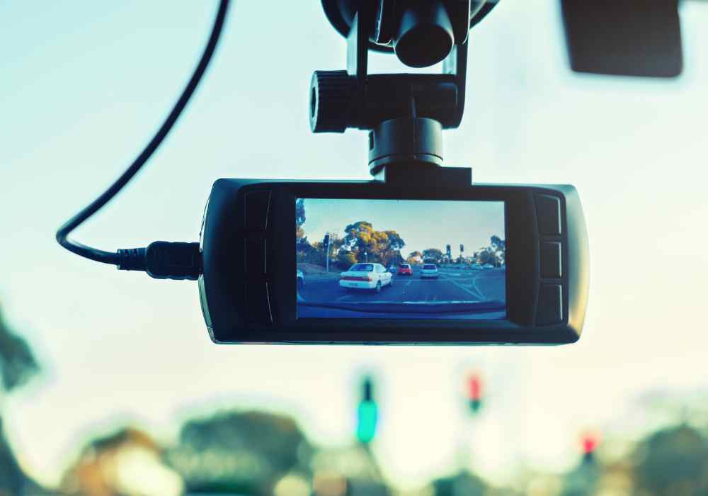 dashcam capturing road footage on a running car